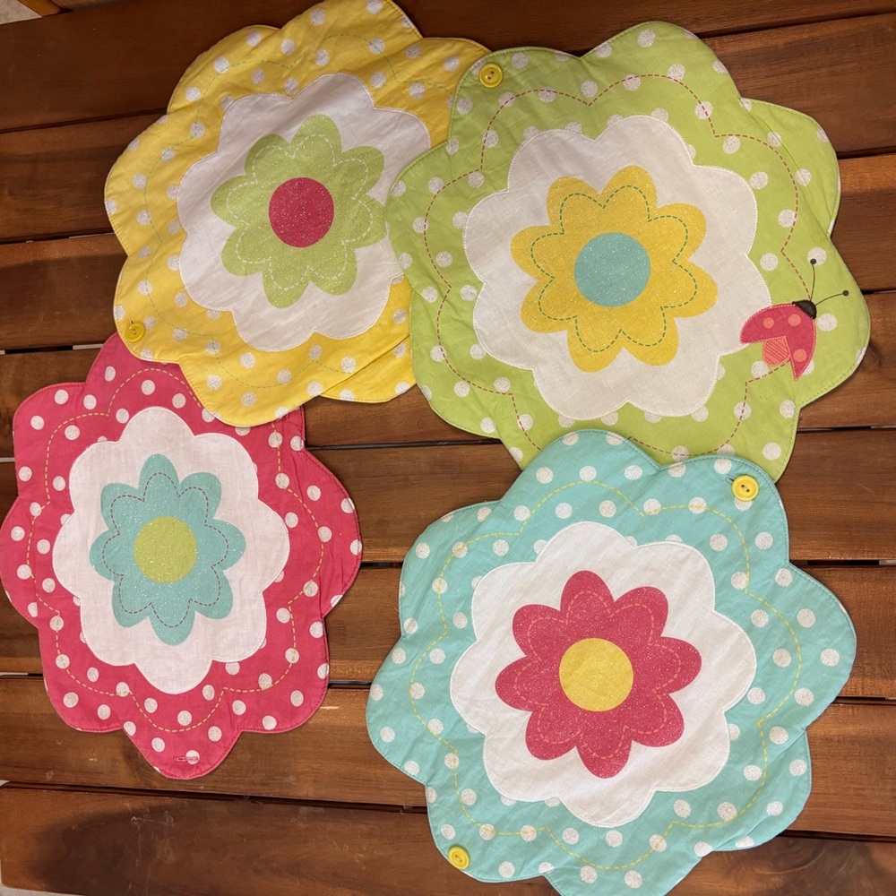 Pastel fabric flower placemats / wall decor for nursery.